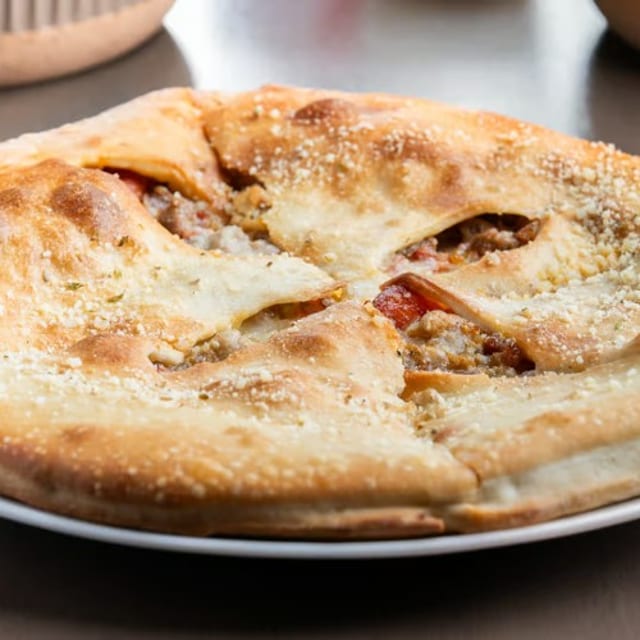 Fugheddaboutit Pizza.