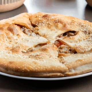 Fugheddaboutit Pizza